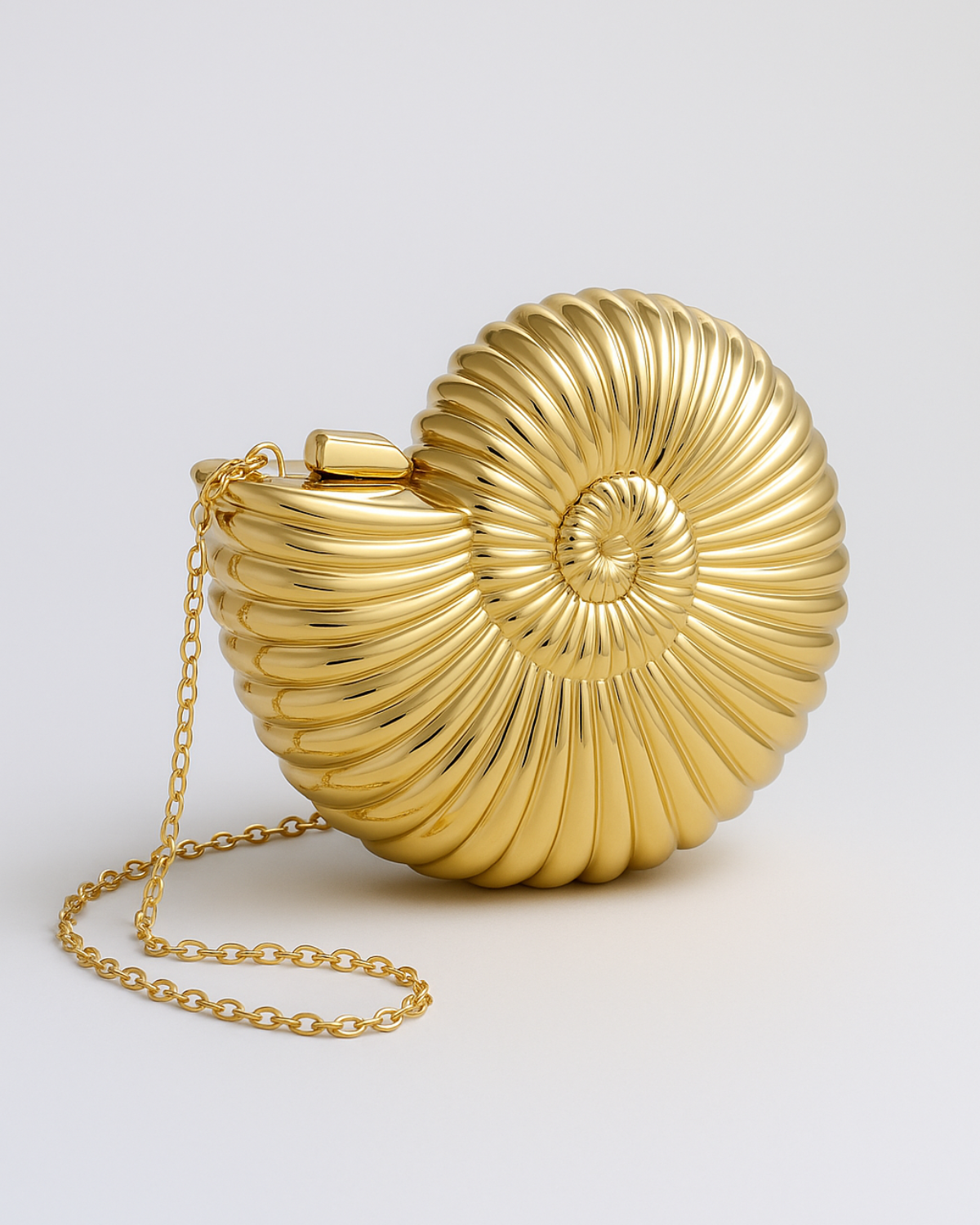 BOLSO CLUTCH CONCHA METÁLICA