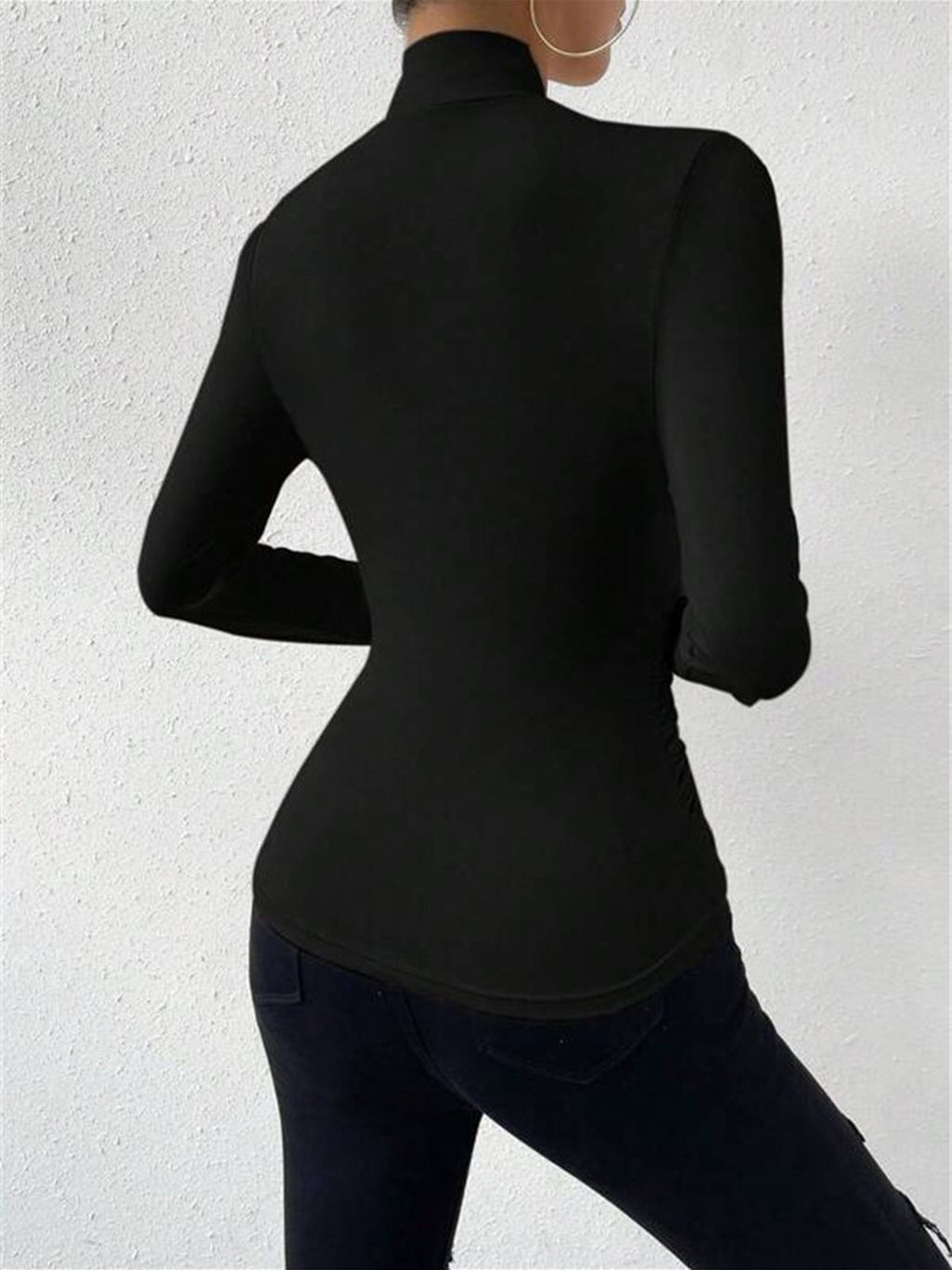 CAMISETA CRUZADA CON CUELLO PLISADO