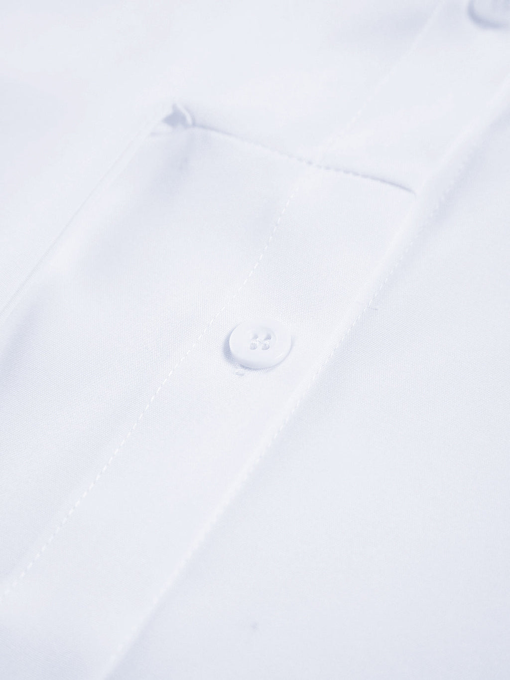 CAMISA LARGA CON BOTONES Y LAZO