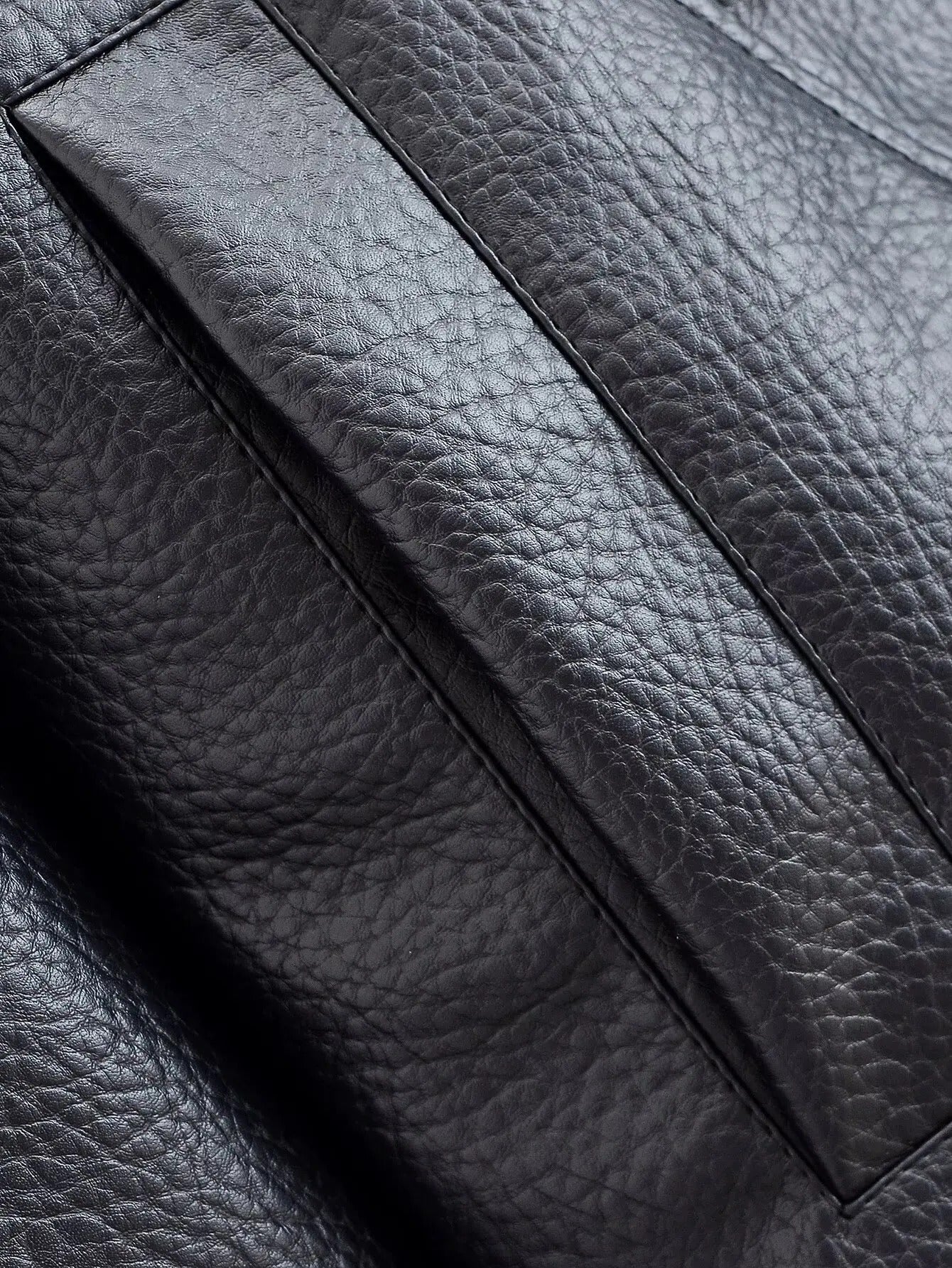 CHAQUETA DE CUERO ASIMÉTRICA